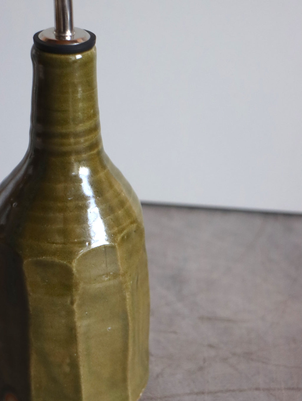 Moss green faceted oil pourer by Hannah Burgess Ceramics, second view