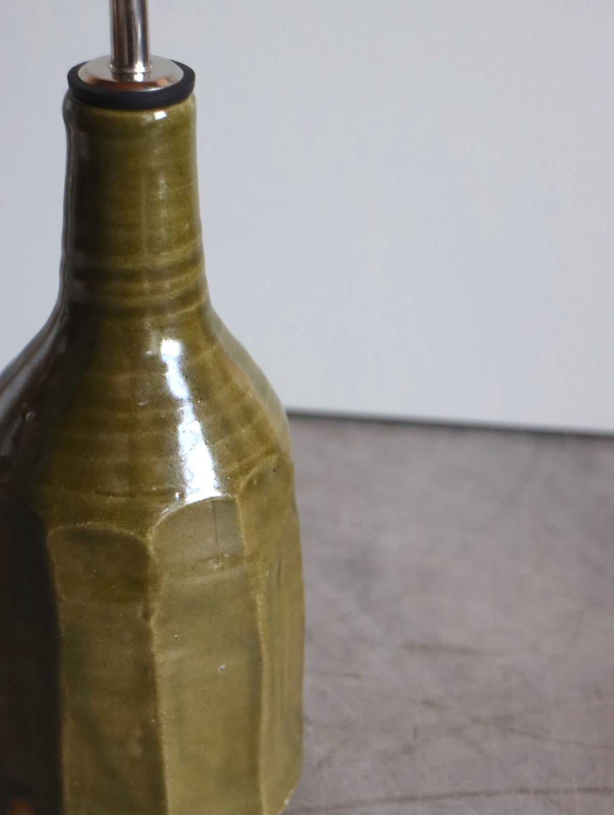 Moss green faceted oil pourer by Hannah Burgess Ceramics, second view
