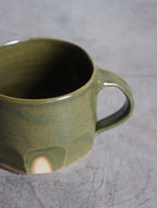 Moss green faceted mug by Hannah Burgess Ceramics, view 3