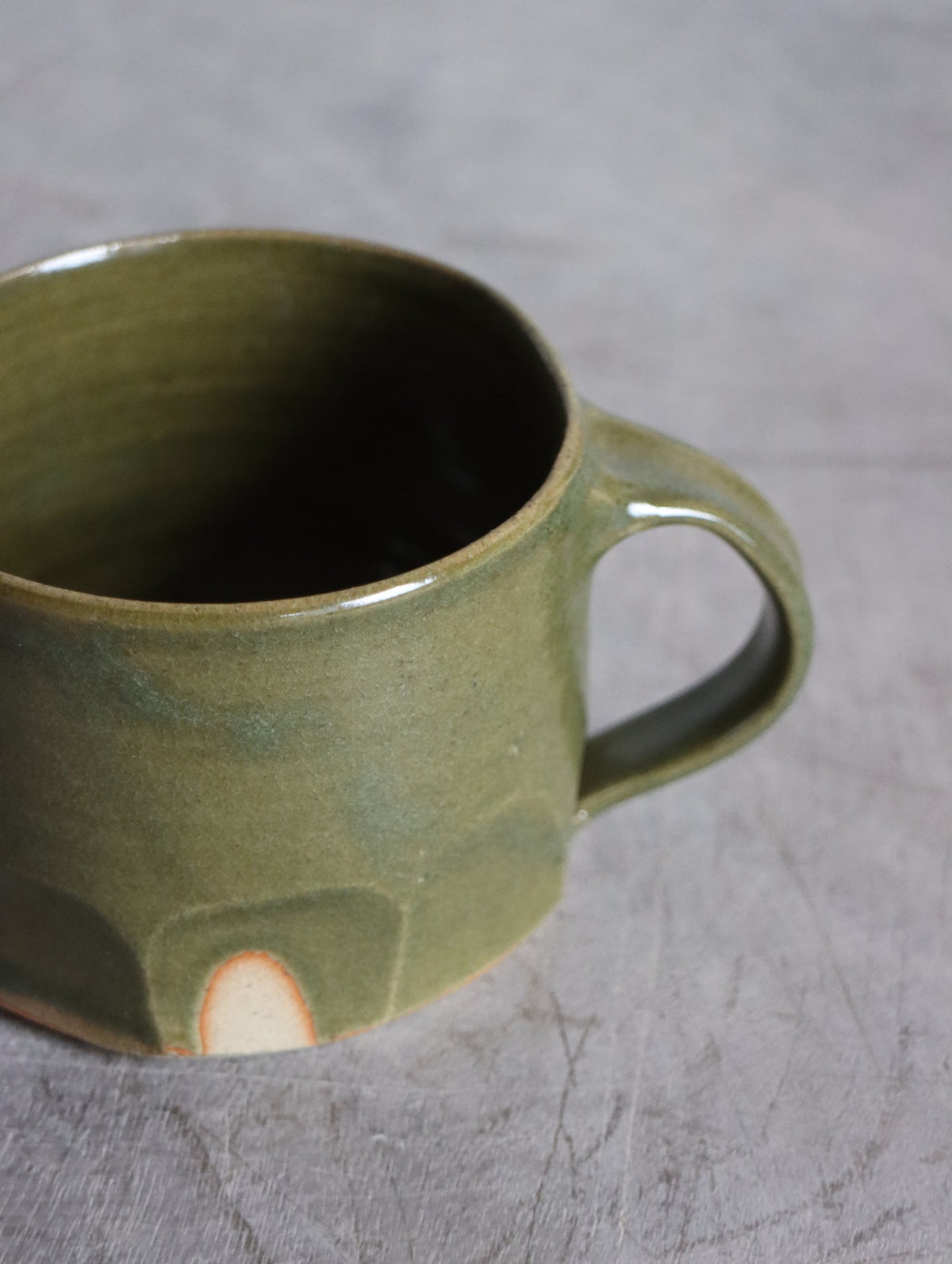 Moss green faceted mug by Hannah Burgess Ceramics, view 3