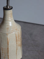 Iron-rich white faceted oil pourer by Hannah Burgess Ceramics, second view