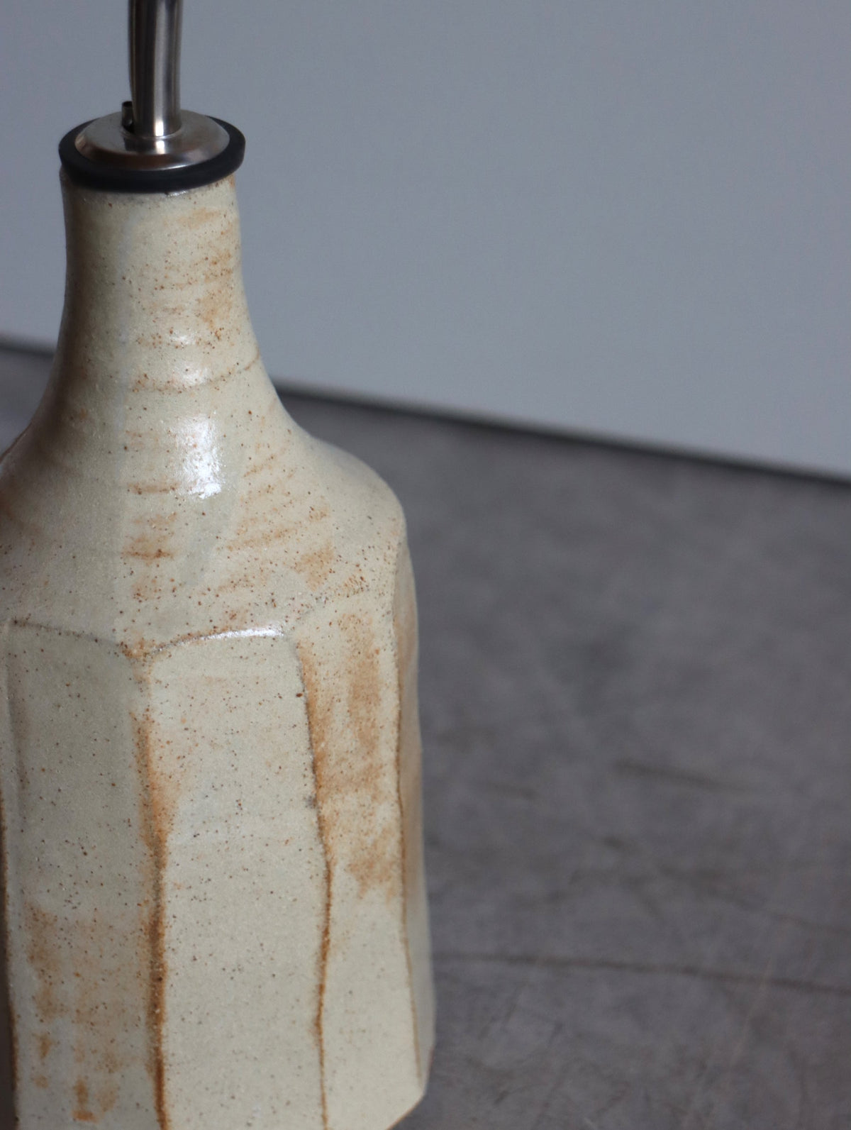 Iron-rich white faceted oil pourer by Hannah Burgess Ceramics, second view